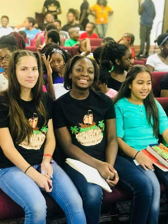 Students gathered together during a youth program session
